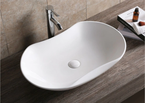 Раковина Ceruttispa CR7031 накладная, белая, усеченный овал 670х415х125 от магазина Vanna-Vanna.ru!