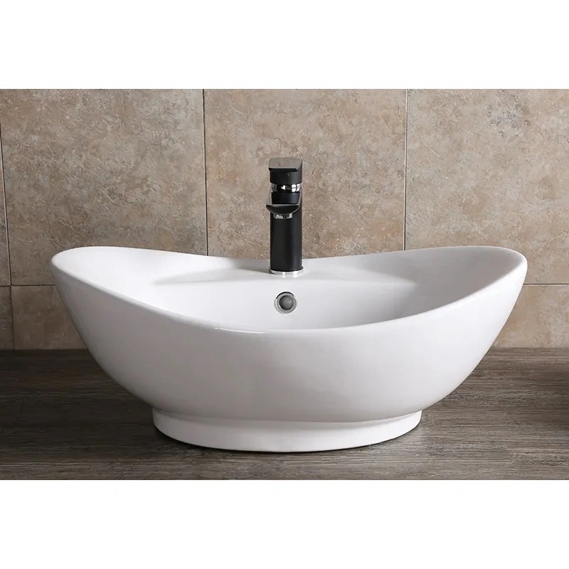 Раковина Ceruttispa CR7003 накладная, белая, овальная, под смеситель, с переливом 600х395х220 от магазина Vanna-Vanna.ru!