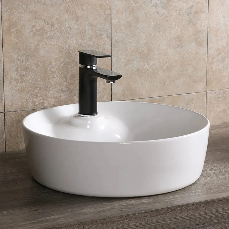 Раковина Ceruttispa CR0090 накладная, белая, круглая, с отверстием под смеситель 440х440х130