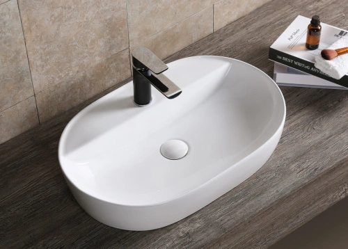 Раковина Ceruttispa CR0076 накладная, белая, овальная, с отверстием под смеситель 500х380х120 от магазина Vanna-Vanna.ru!