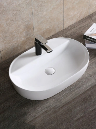 Раковина Ceruttispa CR0074 накладная, белая, овальная, с отверстием под смеситель 600х400х120 от магазина Vanna-Vanna.ru!